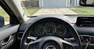 Mazda check engine light illuminated on the instrument cluster