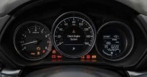 Mazda CX-5 dashboard with multiple warning lights illuminated