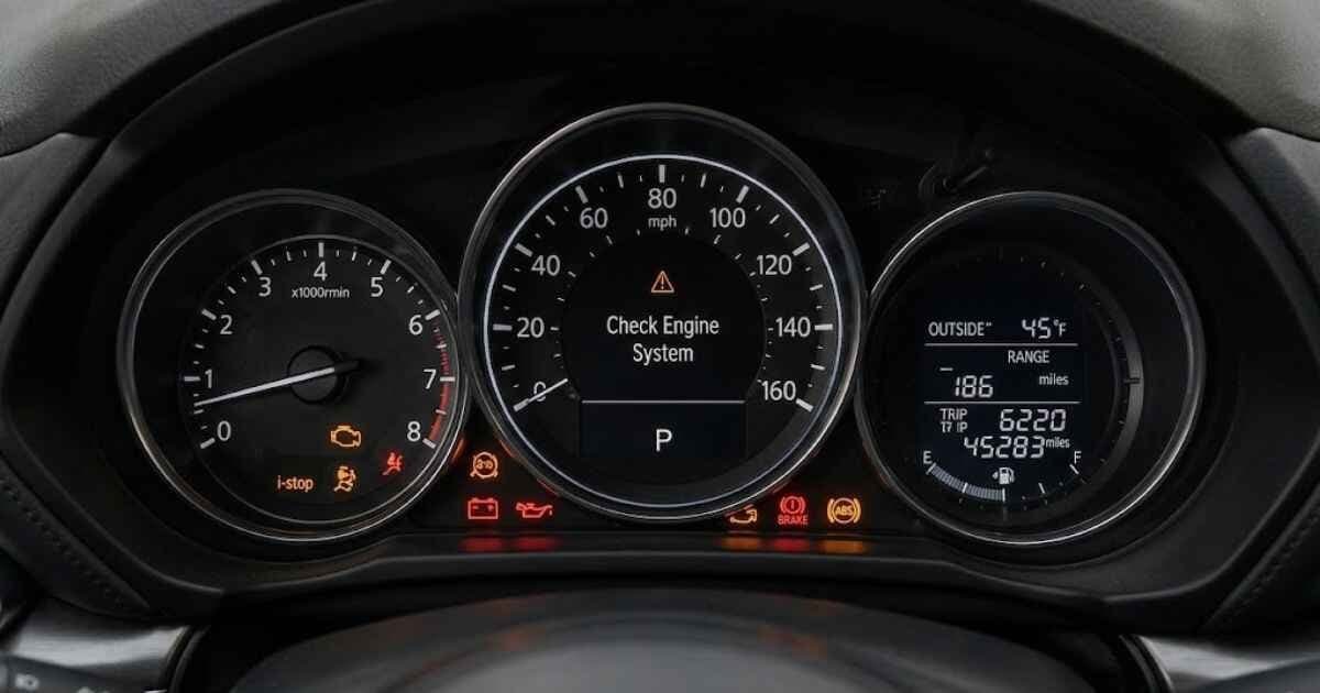 Mazda CX-5 dashboard with multiple warning lights illuminated