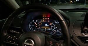 2022 Nissan Altima instrument cluster with multiple warning lights illuminated