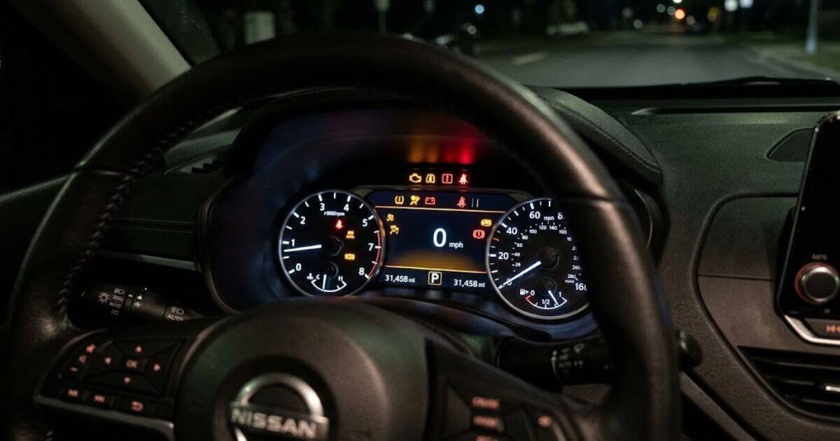 2022 Nissan Altima instrument cluster with multiple warning lights illuminated