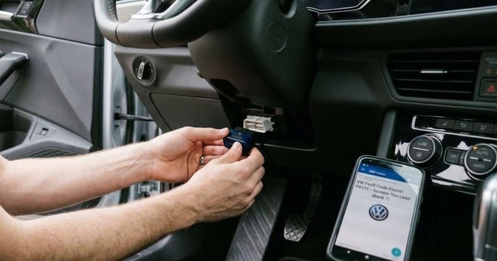 OBD-II scanner connected to 2019 VW Jetta diagnostic port showing fault code