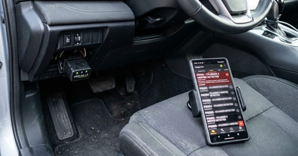 OBD2 scanner plugged in to pull a misfire code from a stuttering car