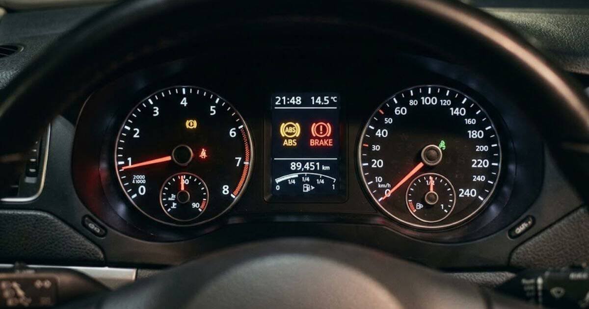 Volkswagen Jetta dashboard with ABS and brake warning lights illuminated